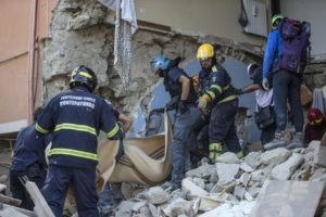 Rescuers of Italian Protezione Civile and firefighters look for missing people on rubble of collapsed building in Amatrice, central Italy, where a 6.1 earthquake struck just after 3:30 a.m., Italy, 24 August 2016. The quake was felt across a broad section of central Italy, including the capital Rome where people in homes in the historic center felt a long swaying followed by aftershocks. ANSA/ MASSIMO PERCOSSI