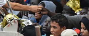 Foto LaPresse - Carmelo Imbesi 05/10/2016 Messina (IT) cronaca Migranti - La nave Golfo Azzurro della ONG olandese Boat Refugee Foundation con a bordo 664 migranti e 7 cadaveri recuperati al largo della Libia arriva al porto di Messina Nella foto: migranti in attesa dello sbarco Photo LaPresse - Carmelo Imbesi 05/10/2016 Messina (IT) news Migrants - The ship Golfo Azzurro of Dutch NGO Boat Refugee Foundation carrying 664 migrants and 7 bodies recovered off the coast of Libya arrives at the port of Messina In the pic: migrants wait to disembark